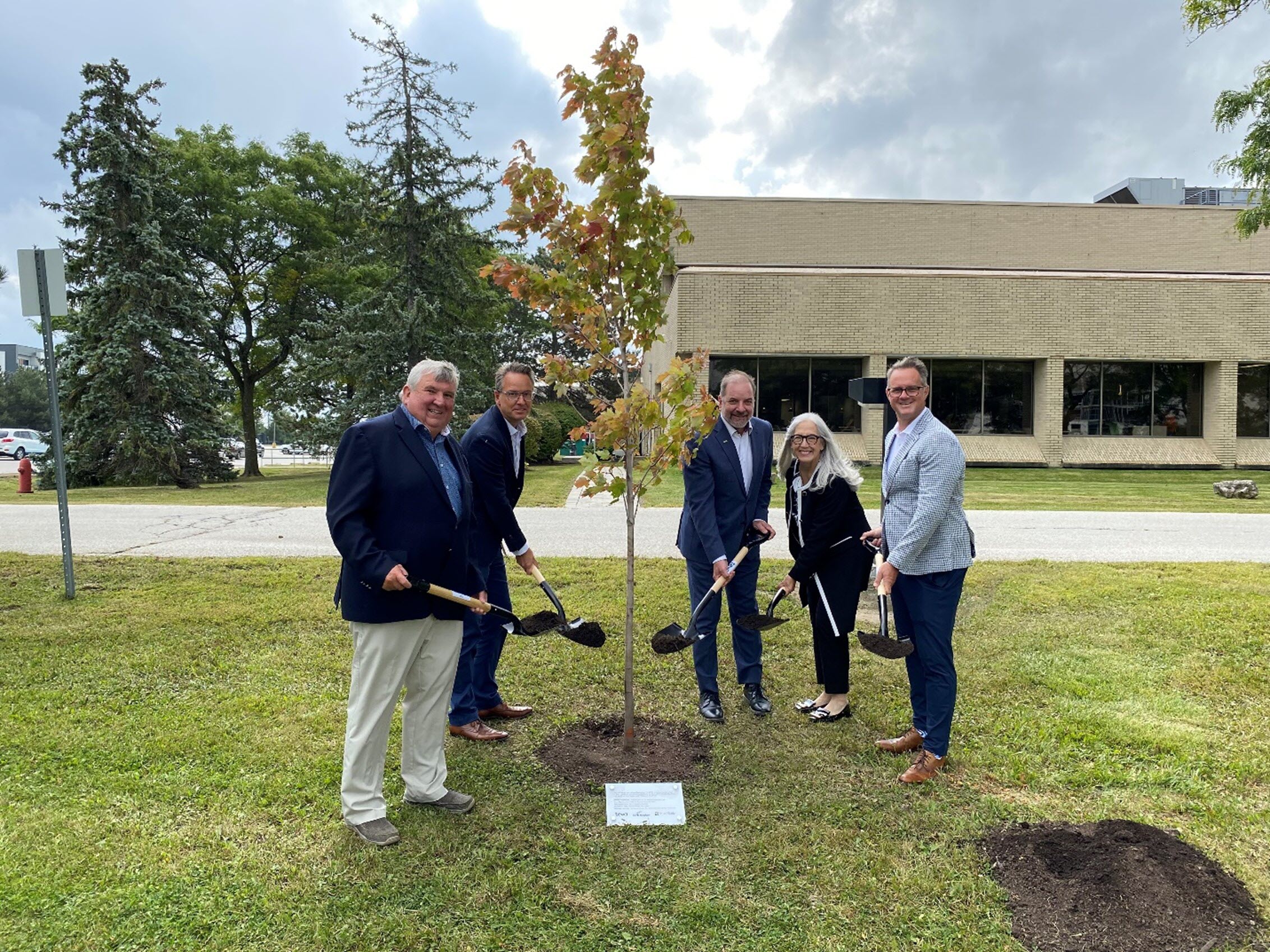 Planting a tree on the grounds of Teva&rsquo;s Stouffville manufacturing site to commemorate the guests&rsquo; visit.jpg