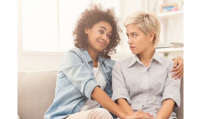 Friends sitting on the coach