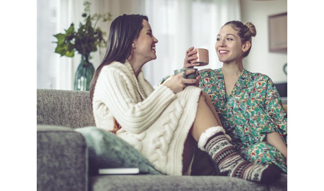 Friends talking and dinking tea