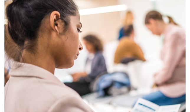girl reading in the waiting room