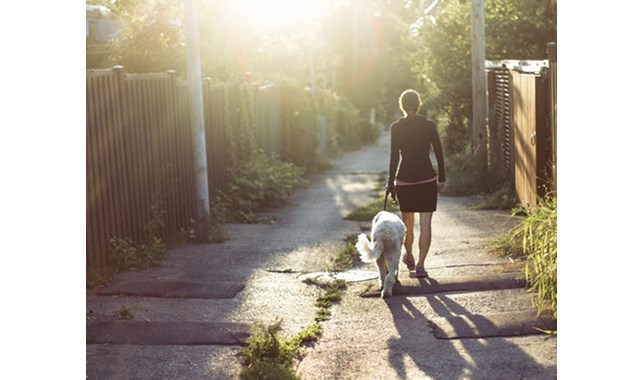 Woman walking with dog